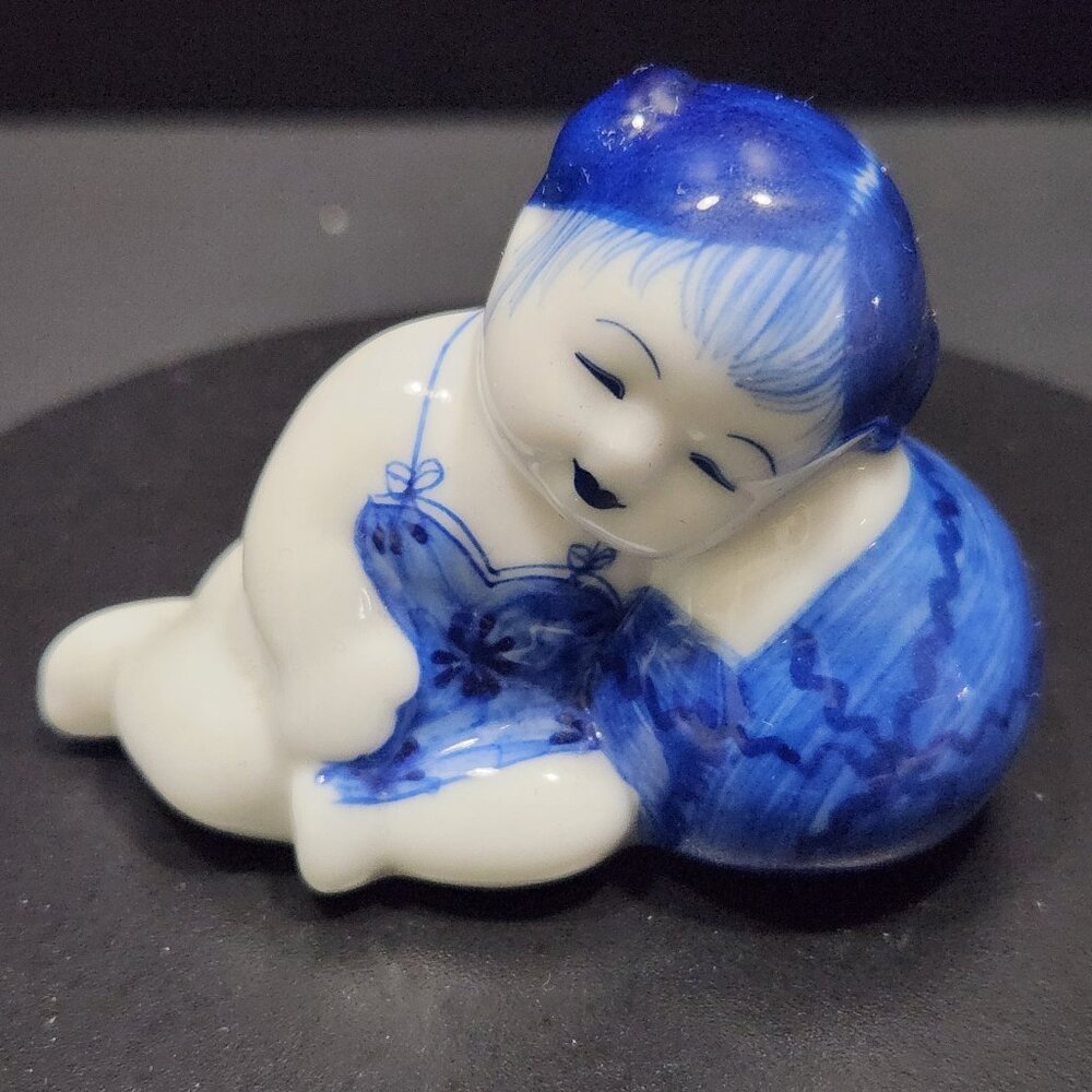 Vintage Asian Girl Sleeping On Watermelon Blue/White Ceramic Figurine